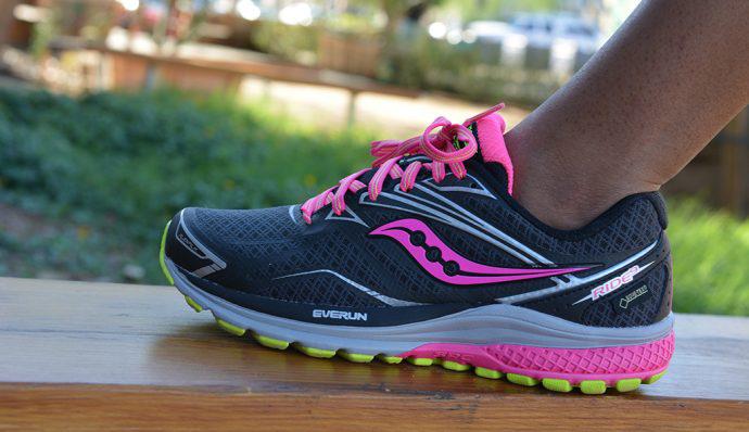 Female stands in Saucony Ride 9 GTX® Shoe