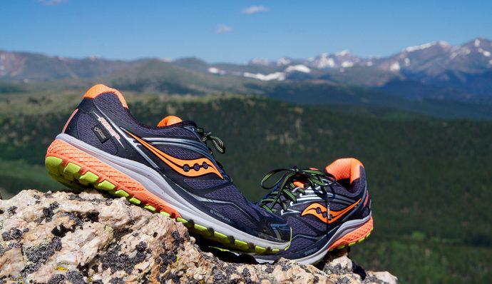 Saucony Ride 9 GTX® Shoes perched on a mountain top