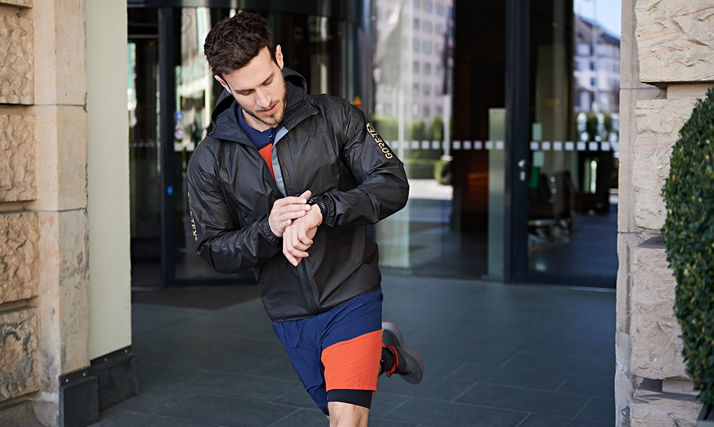 man on business going to run in shakedry jacket