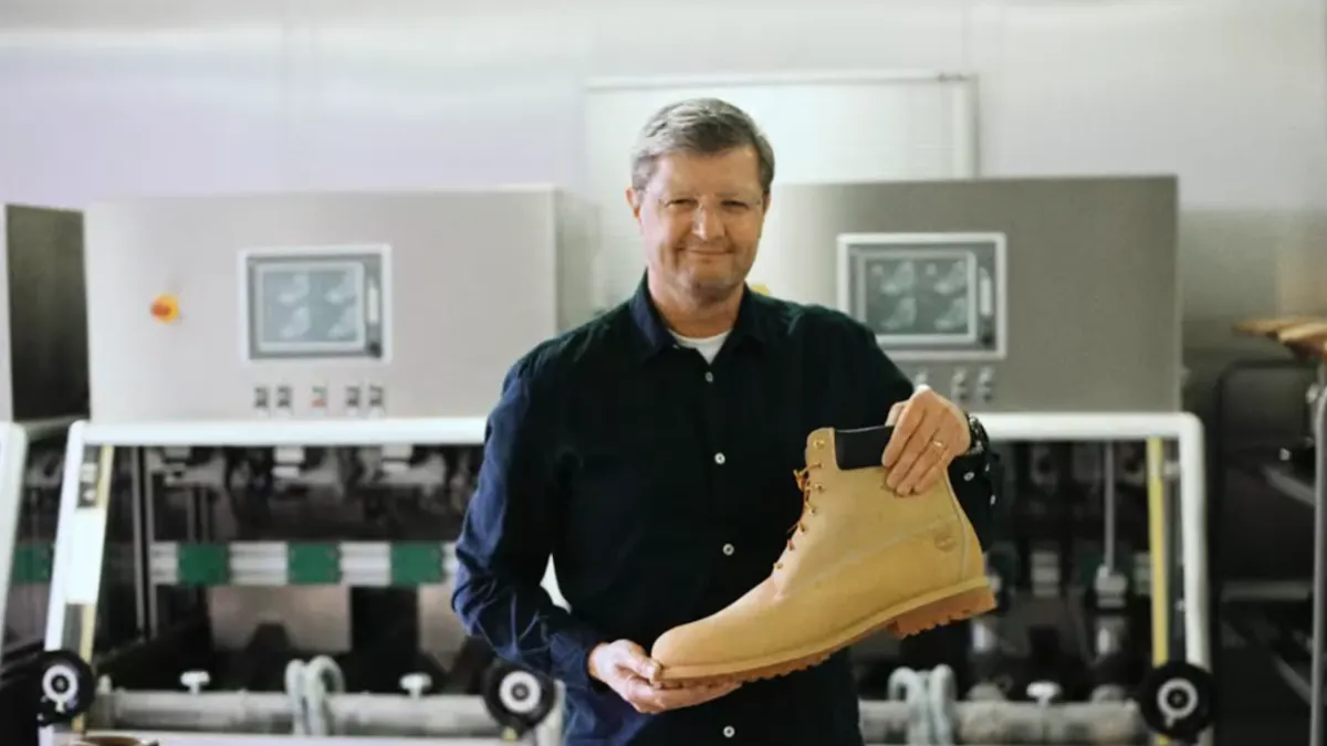 Stefan Trainer, holding a GORE-TEX Boot in the Gore labs