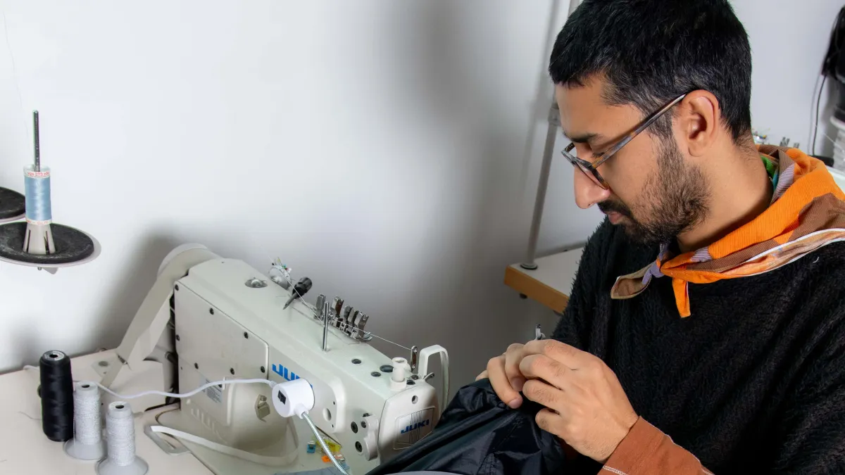 Jaimus sewing a GORE-TEX bag