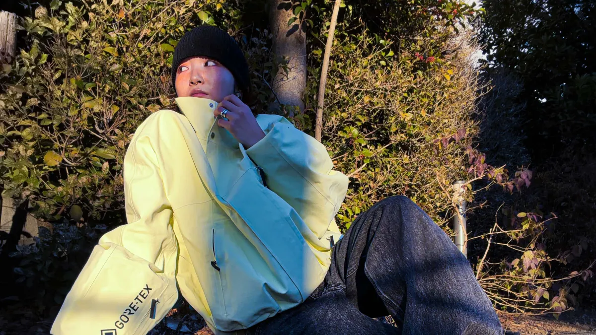 Ami sitting on a path ledge
